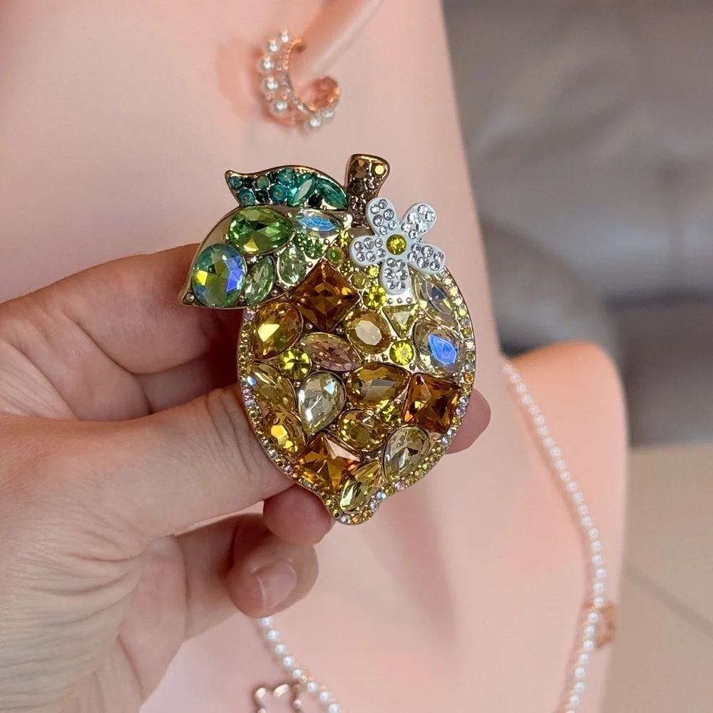 Elegant Gold and Green Crystal Brooch